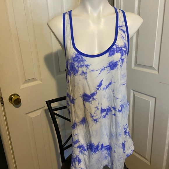 Tops - Large work out tank 
Size and brand cut out 
Measurements in photos